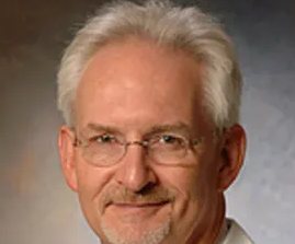 Dr. Evander Corley
